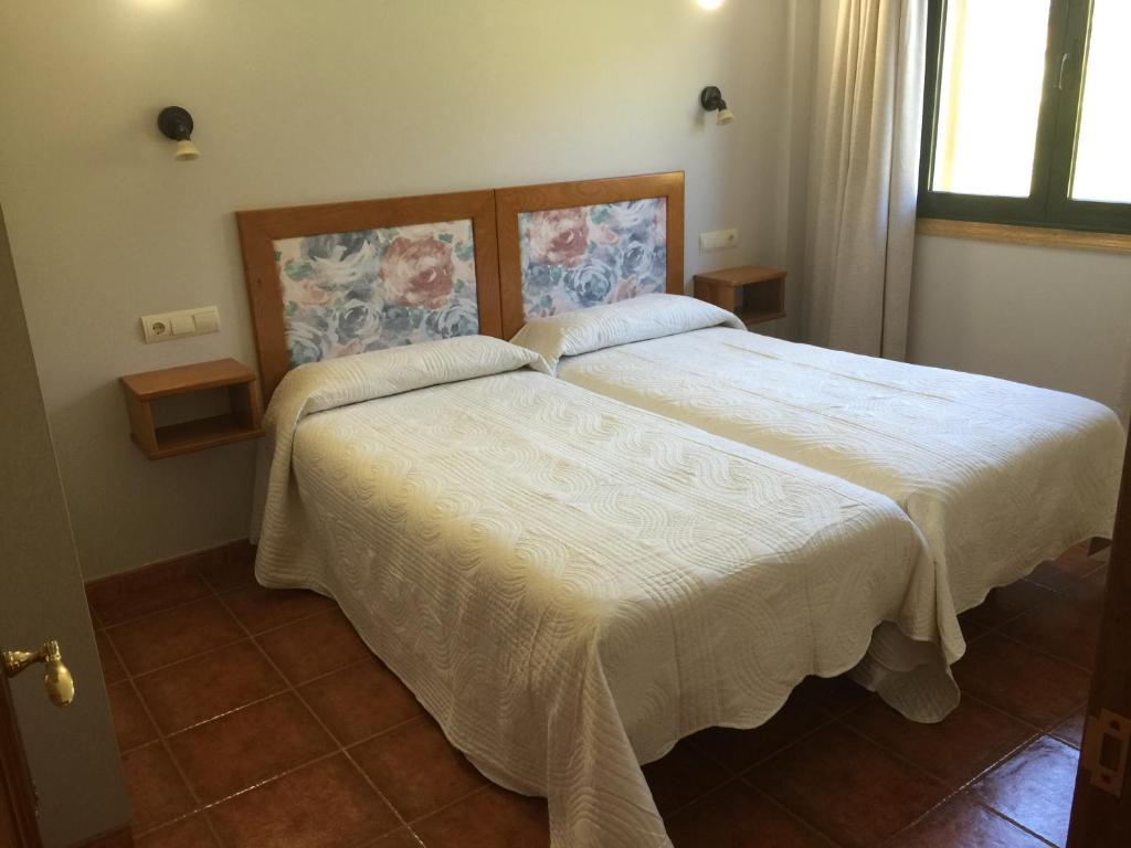 Postel nebo postele na pokoji v ubytování Alojamiento en entorno rural Los Trobos