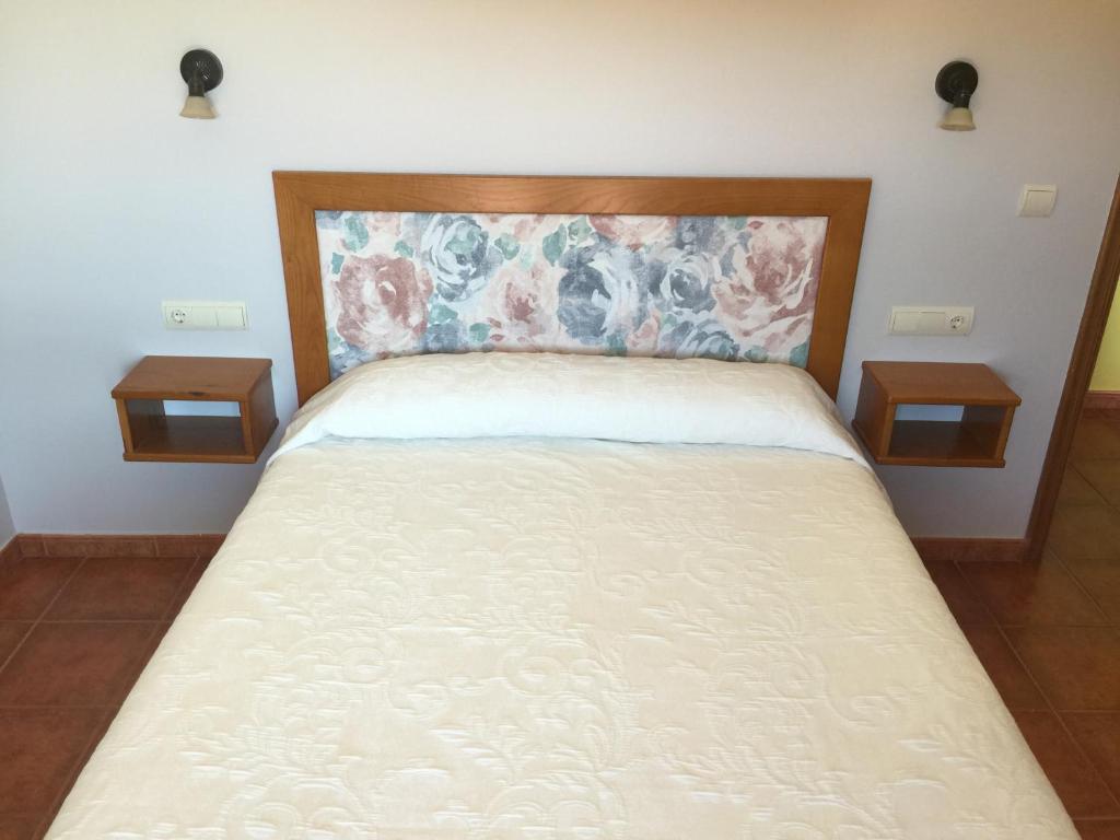Postel nebo postele na pokoji v ubytování Alojamiento en entorno rural Los Trobos
