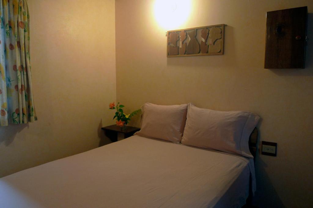 Postel nebo postele na pokoji v ubytování Hostal Hansi