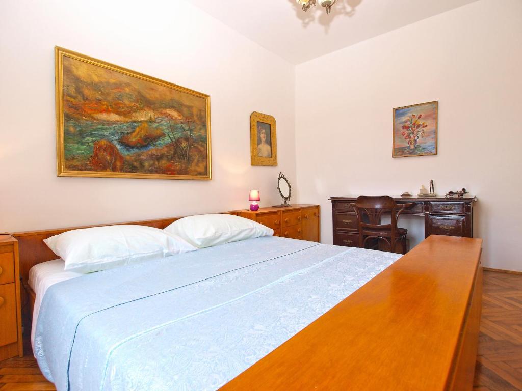 Łóżko lub łóżka w pokoju w obiekcie Apartments Paulina 1347