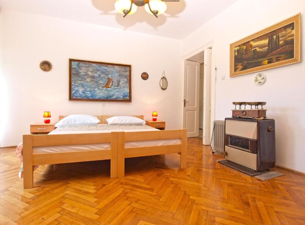 Łóżko lub łóżka w pokoju w obiekcie Apartments Paulina 1347