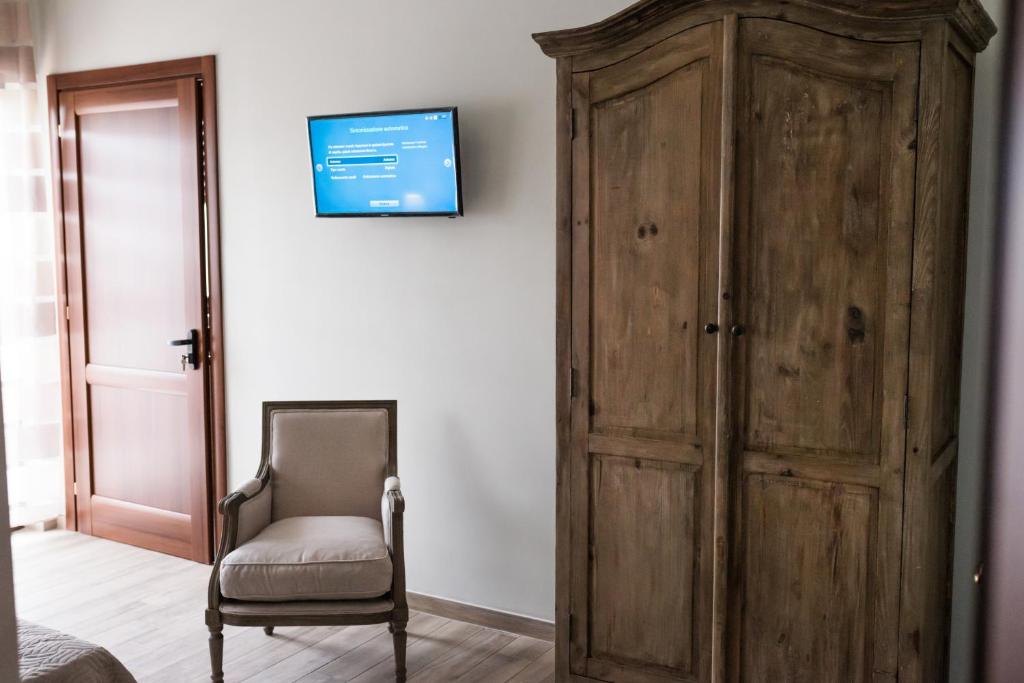 TV a/nebo společenská místnost v ubytování INFORMIS B&B