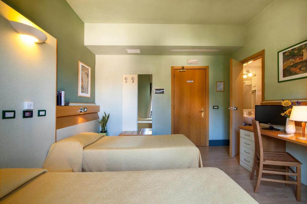 Postel nebo postele na pokoji v ubytování Duca Del Mare - Hotel Di Nardo group