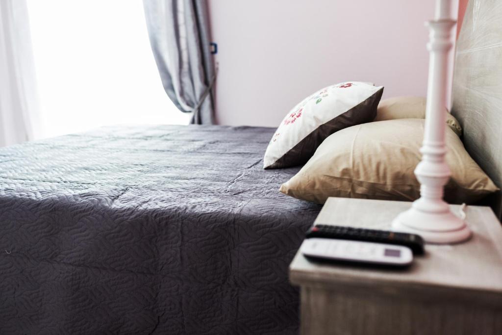 Postel nebo postele na pokoji v ubytování INFORMIS B&B