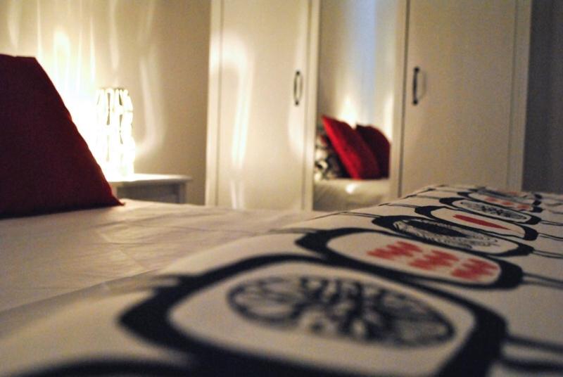 Łóżko lub łóżka w pokoju w obiekcie B&B Scilla Mare