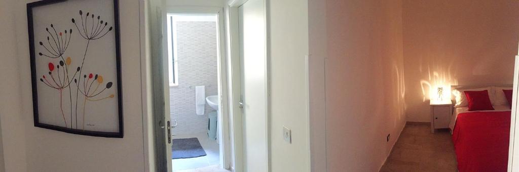 Łóżko lub łóżka w pokoju w obiekcie B&B Scilla Mare