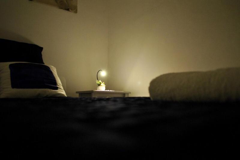 Łóżko lub łóżka w pokoju w obiekcie B&B Scilla Mare