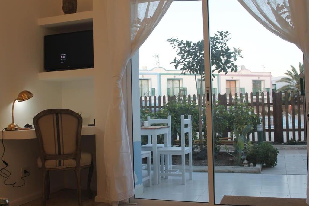 A balcony or terrace at Magnifico apartamento en las dunas de corralejo