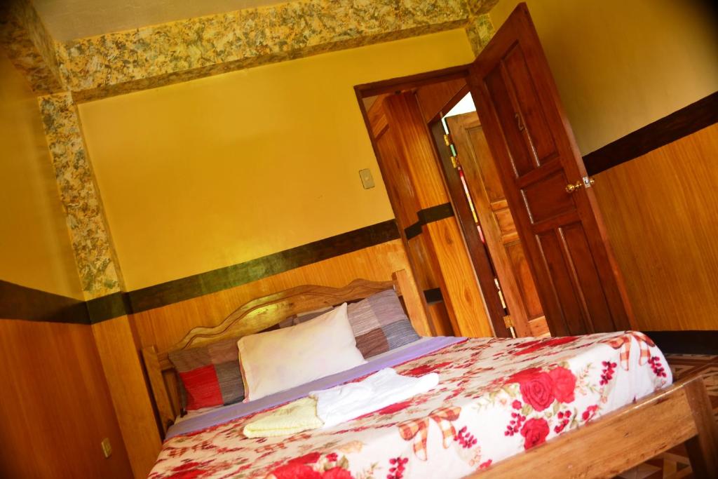 Postel nebo postele na pokoji v ubytování Banaue Greenfields Inn