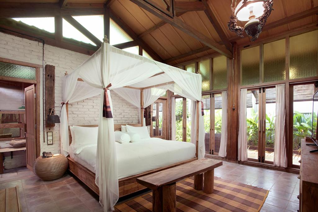 Postel nebo postele na pokoji v ubytování Desa Alamanis Resort Villa