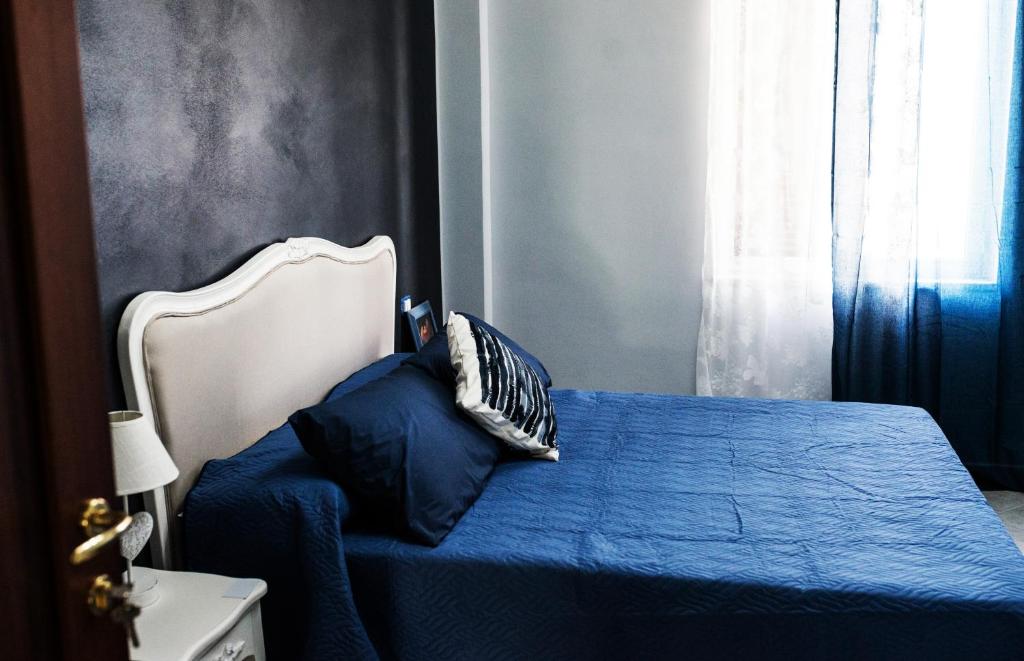 Postel nebo postele na pokoji v ubytování INFORMIS B&B