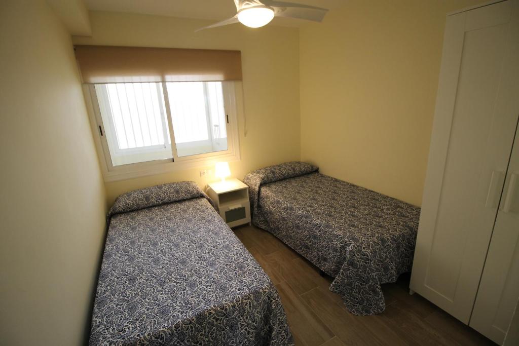 Postel nebo postele na pokoji v ubytování Bellavista apartment