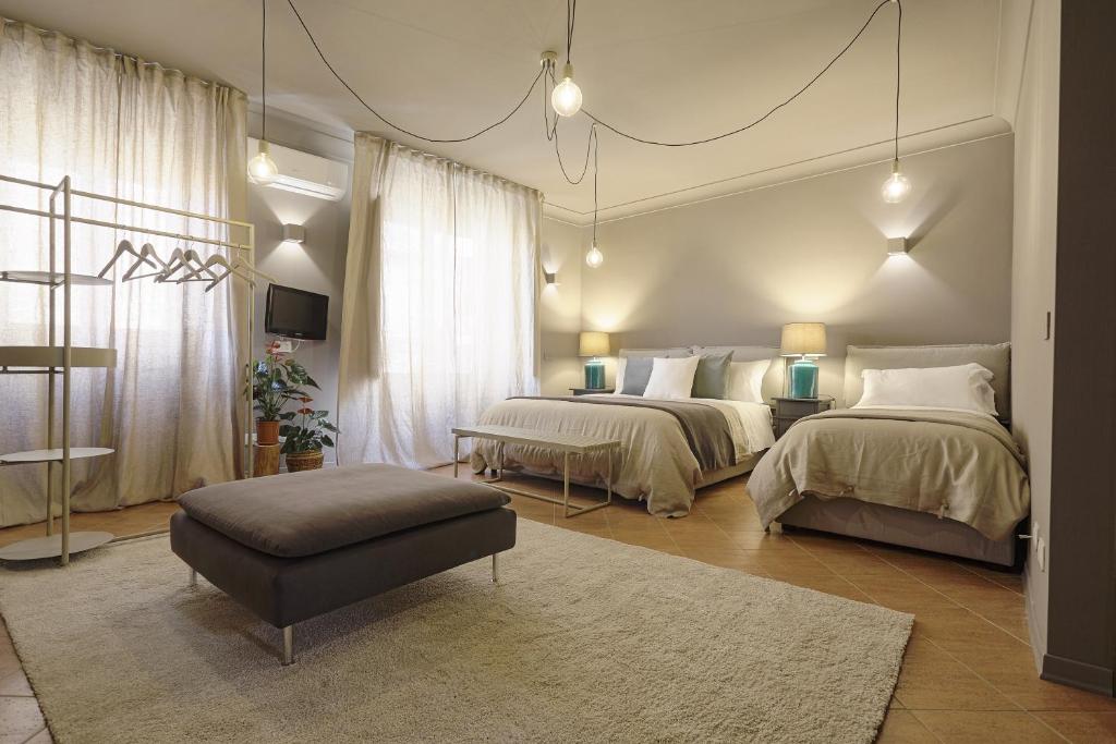 Postel nebo postele na pokoji v ubytování B&B Palazzo Bibirria