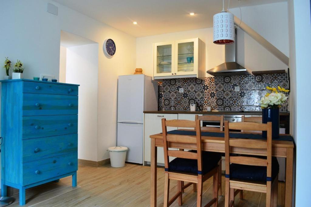 Kuchyň nebo kuchyňský kout v ubytování Apartment Buccarizza