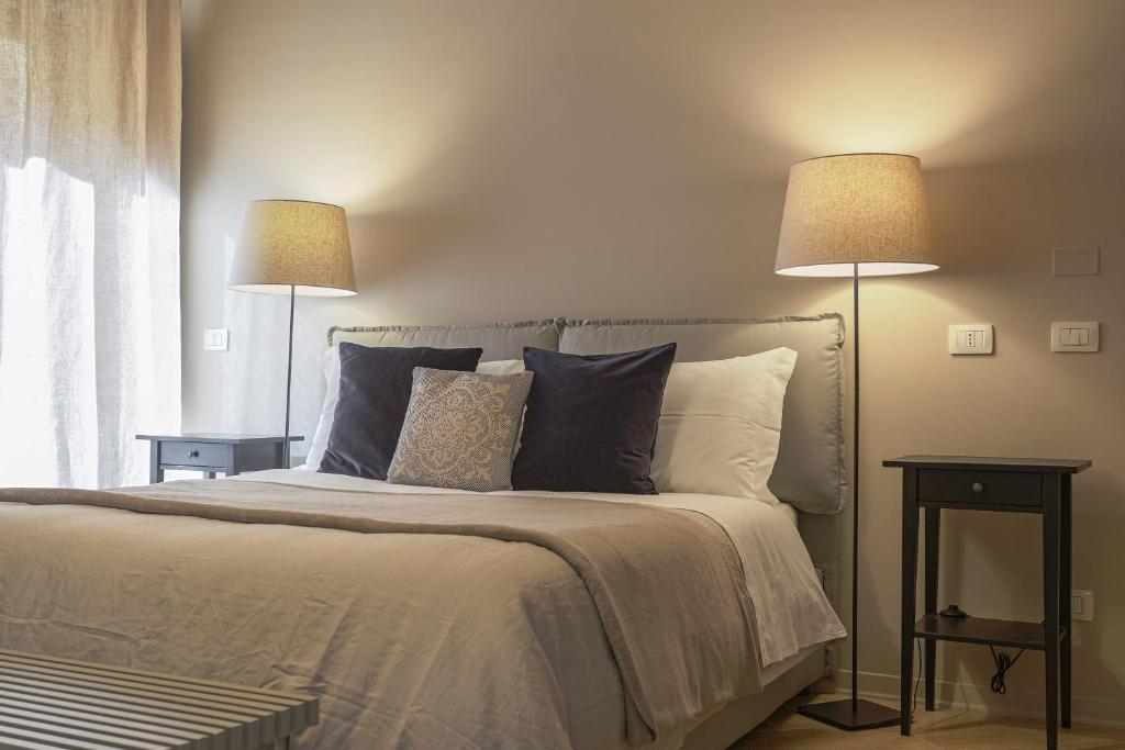 Postel nebo postele na pokoji v ubytování B&B Palazzo Bibirria