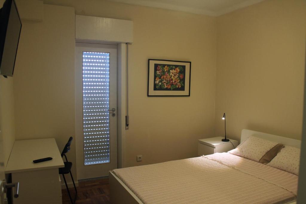 Postel nebo postele na pokoji v ubytování MicroRent Rooms
