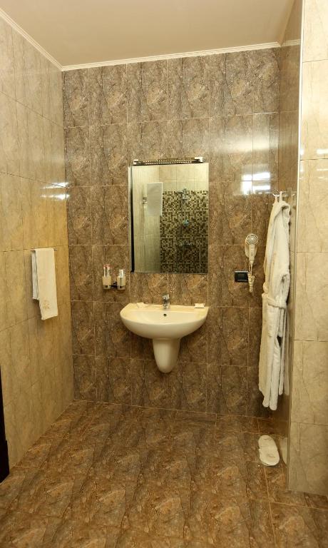 Koupelna v ubytování Avan Plaza Hotel