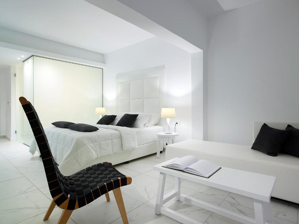 Кровать или кровати в номере Dimitra Beach Hotel & Suites