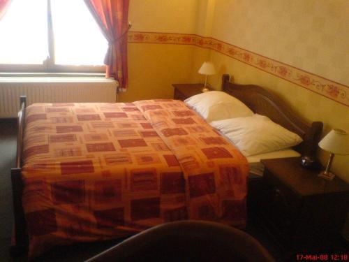 Postel nebo postele na pokoji v ubytování B&B Le Petit Normand