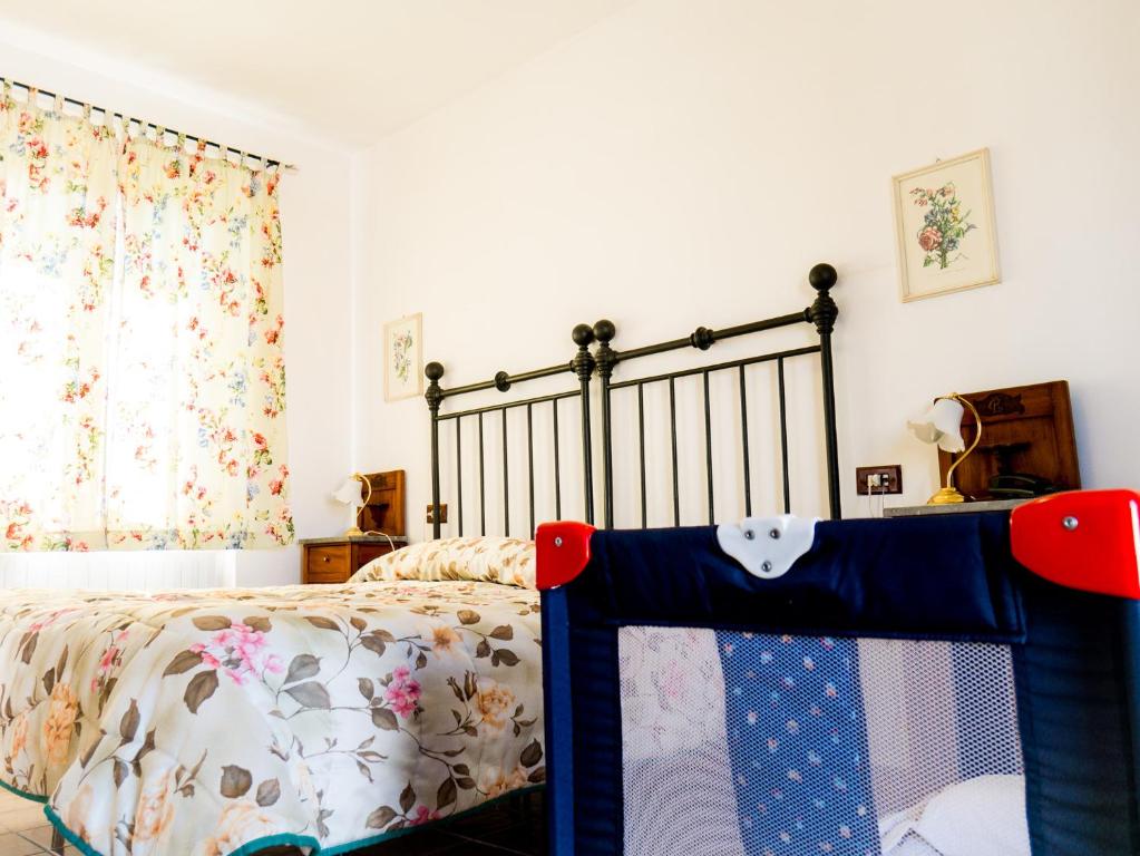 Postel nebo postele na pokoji v ubytování Hotel Albergo Ristorante Il Ciclope
