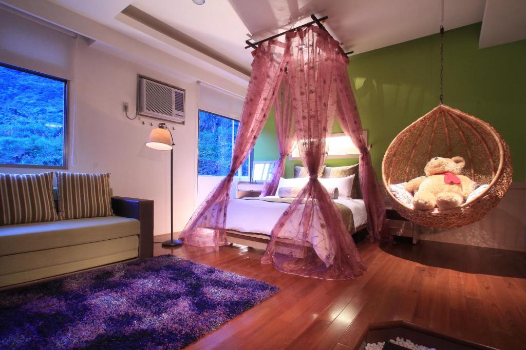 เตียงในห้องที่ Cha Guo Zi