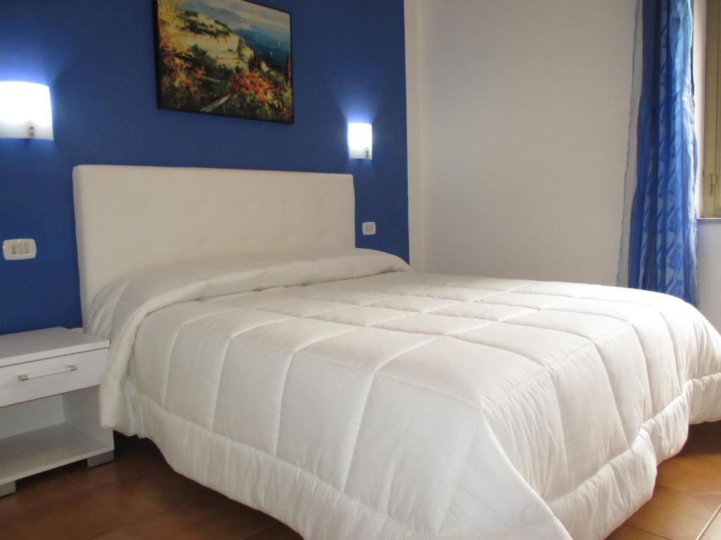 Posteľ alebo postele v izbe v ubytovaní Palinuro casa vacanze "Donna Antonia"