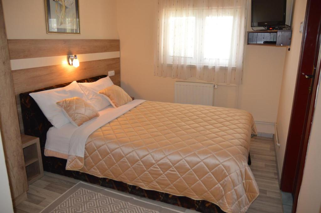 Postel nebo postele na pokoji v ubytování Hotel Čile