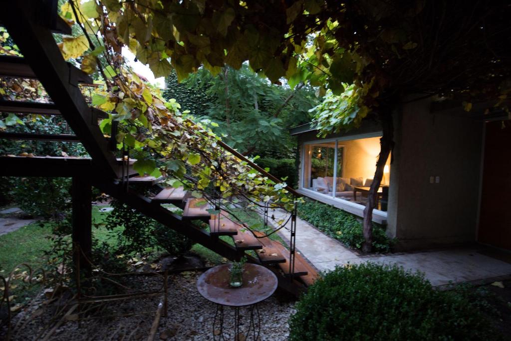 a set of stairs leading up to a house at Casa Lila in Mendoza