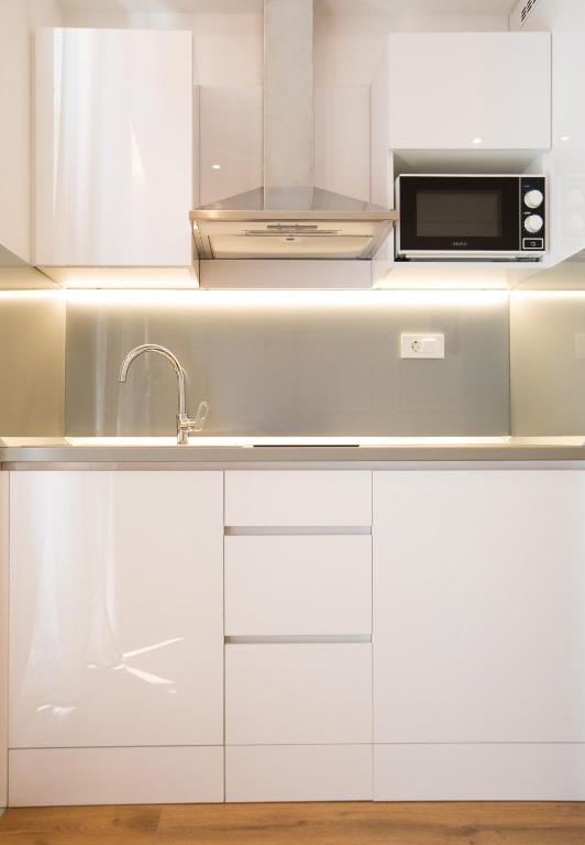 Kuchyň nebo kuchyňský kout v ubytování Casa Arancia
