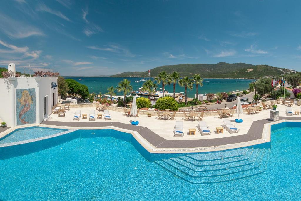 an aerial view of a resort with a pool at Torbahan Hotel in Torba