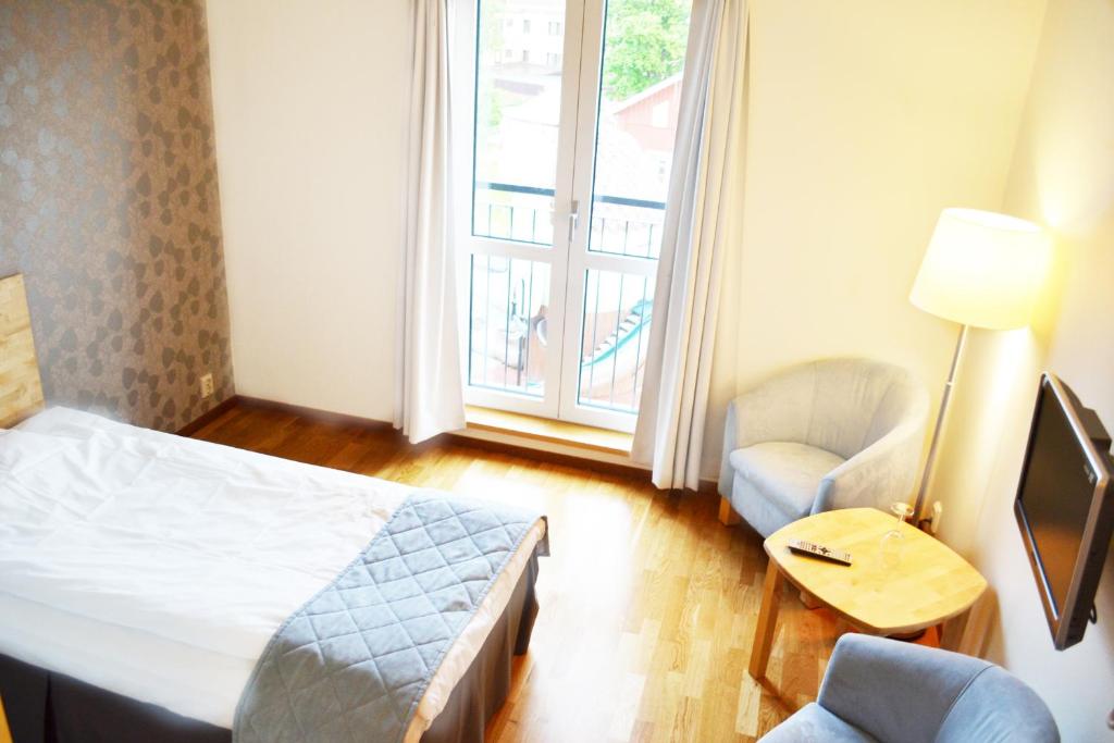 Postel nebo postele na pokoji v ubytování Hotell Årjäng