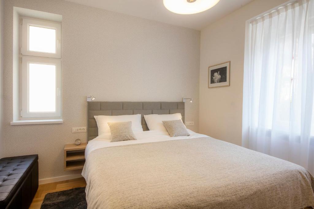 Posteľ alebo postele v izbe v ubytovaní Apartments N10 Zagreb