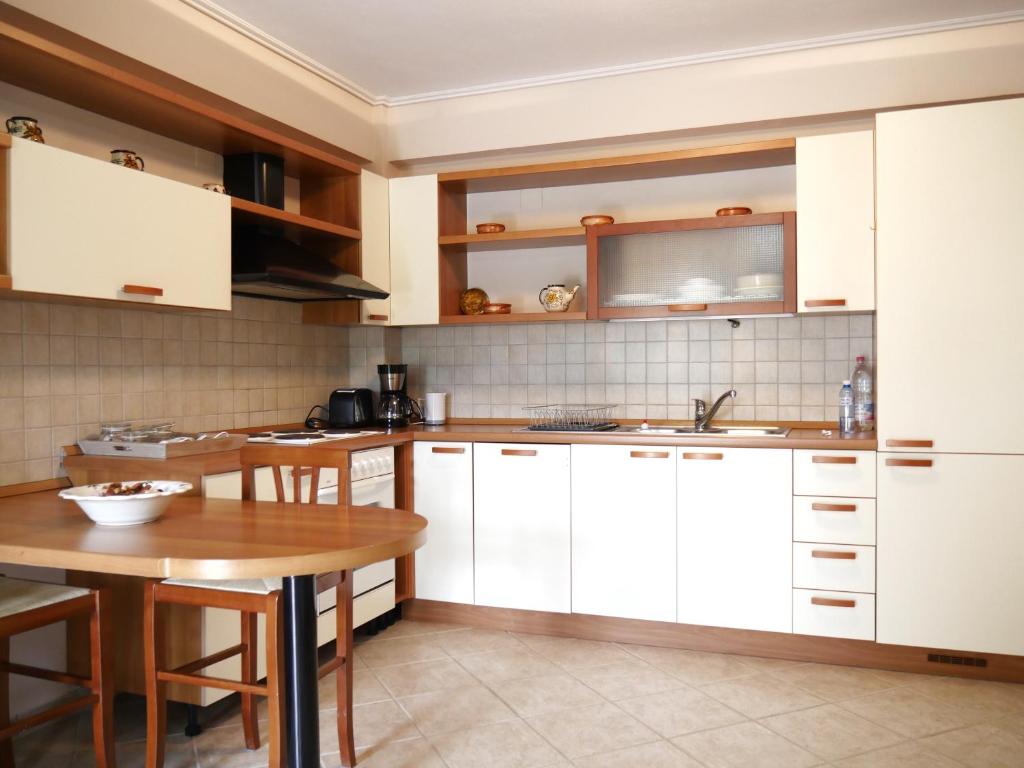 Kuchyňa alebo kuchynka v ubytovaní Villa Victoria Boutique Apartments