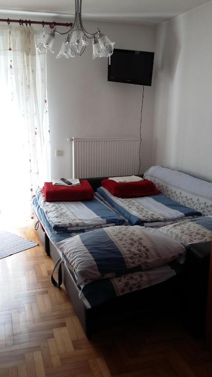 Postel nebo postele na pokoji v ubytování Guest House Potok