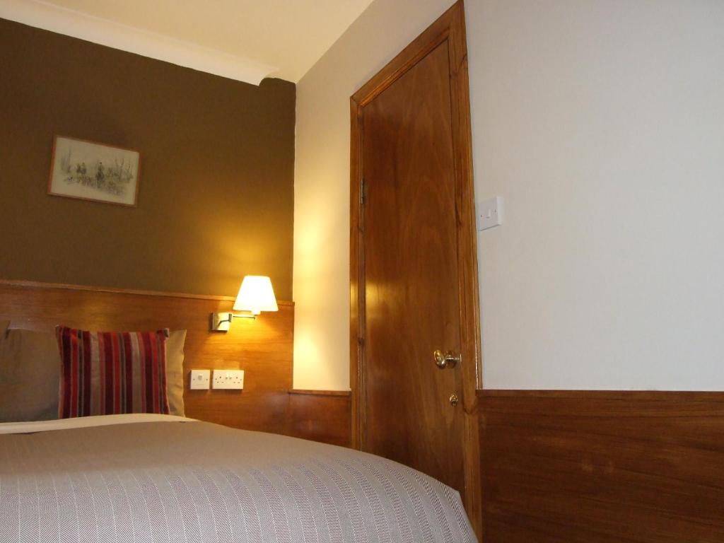 Postel nebo postele na pokoji v ubytování Leith House