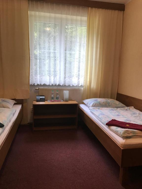 Postel nebo postele na pokoji v ubytování Chata Rosa