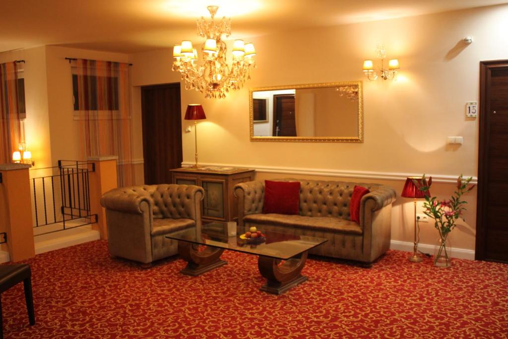 Posezení v ubytování Hotel Al Faro Lodge am See