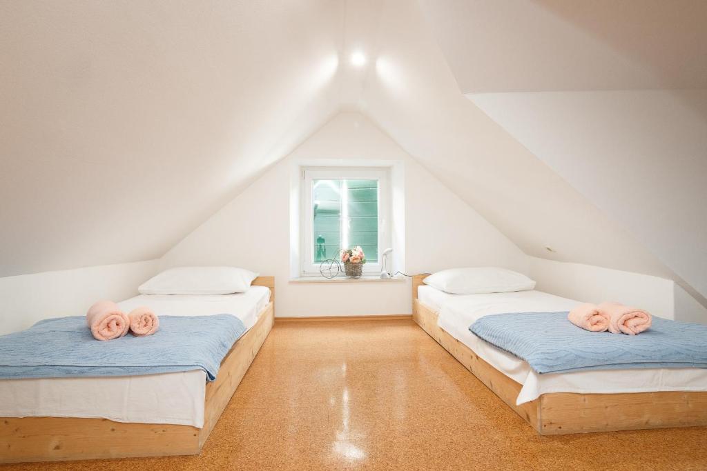 Postel nebo postele na pokoji v ubytování Split Inn Apartments