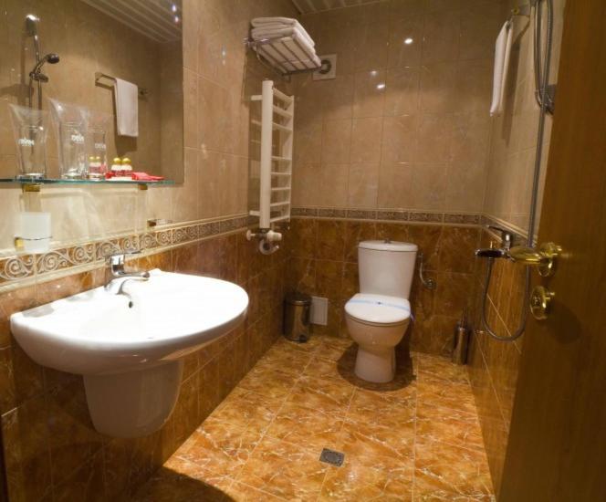 Koupelna v ubytování Hotel Central