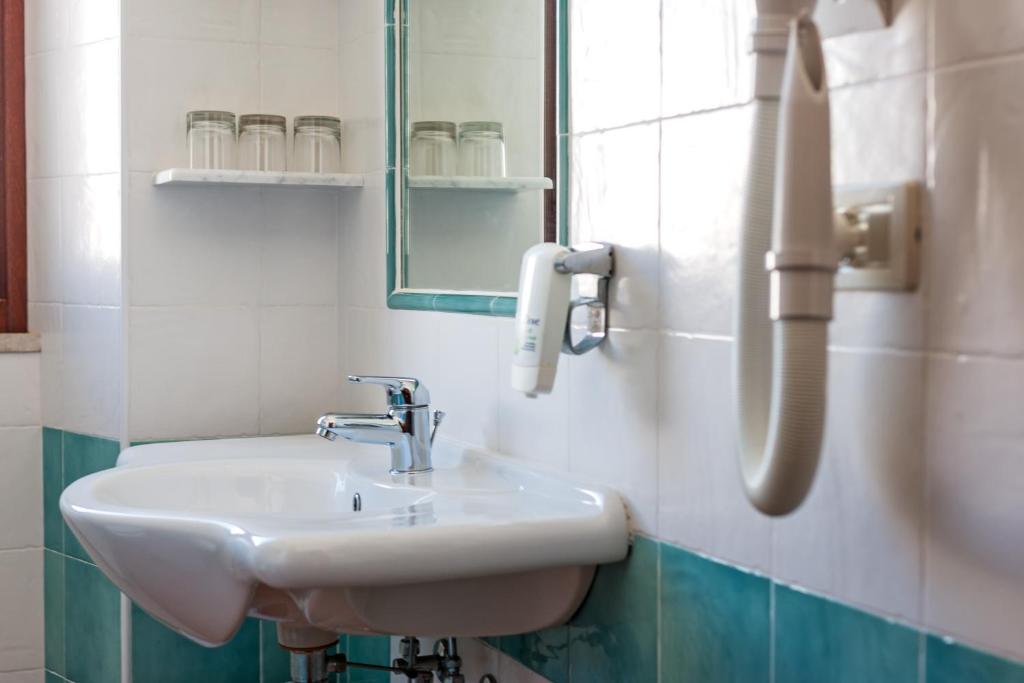 Koupelna v ubytování Hotel Il Querceto