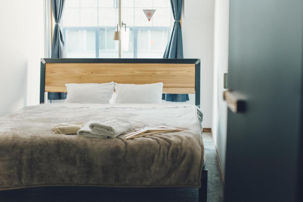 Postel nebo postele na pokoji v ubytování CITAN Hostel