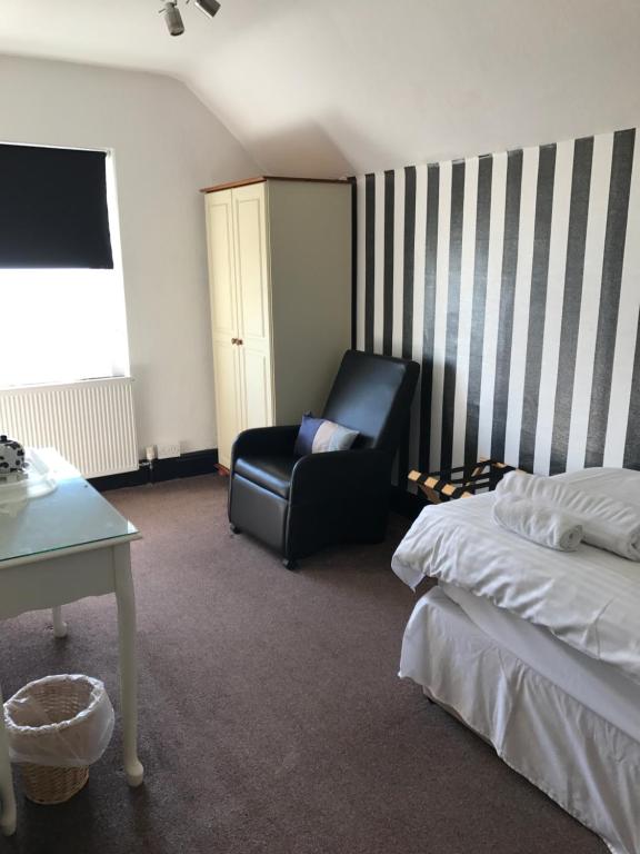 Postel nebo postele na pokoji v ubytování Edelweiss Guest House