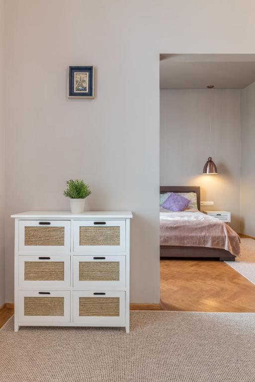 Postel nebo postele na pokoji v ubytování Delis Apartments - Dluga Street 11/3