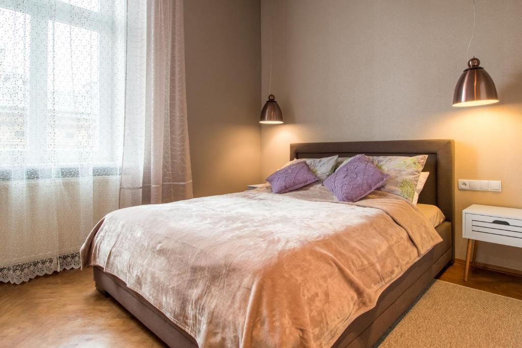Postel nebo postele na pokoji v ubytování Delis Apartments - Dluga Street 11/3