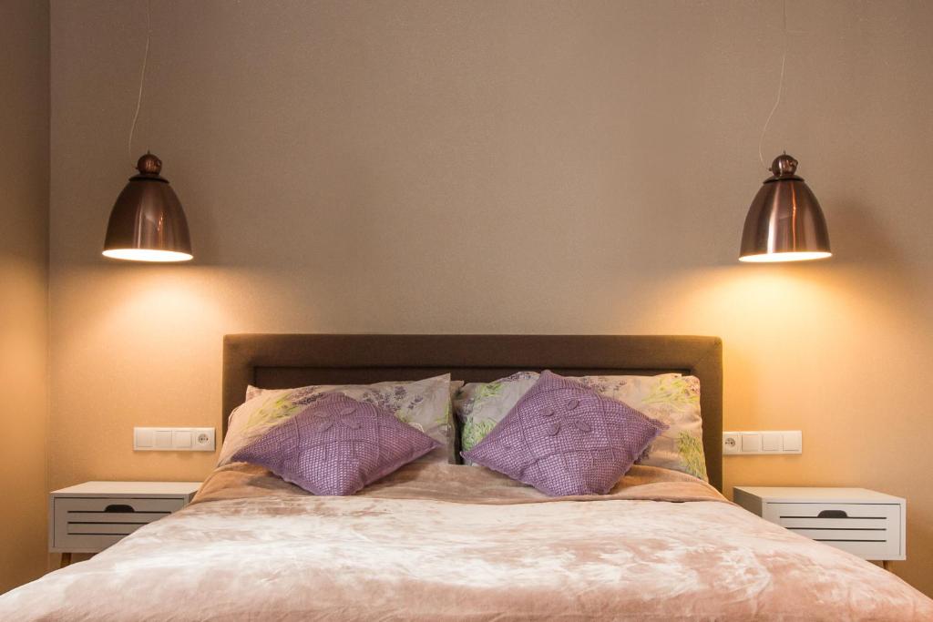 Postel nebo postele na pokoji v ubytování Delis Apartments - Dluga Street 11/3
