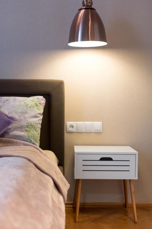 Postel nebo postele na pokoji v ubytování Delis Apartments - Dluga Street 11/3