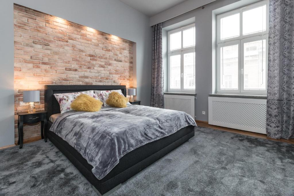 Postel nebo postele na pokoji v ubytování Delis Apartments - Dluga Street 11/3