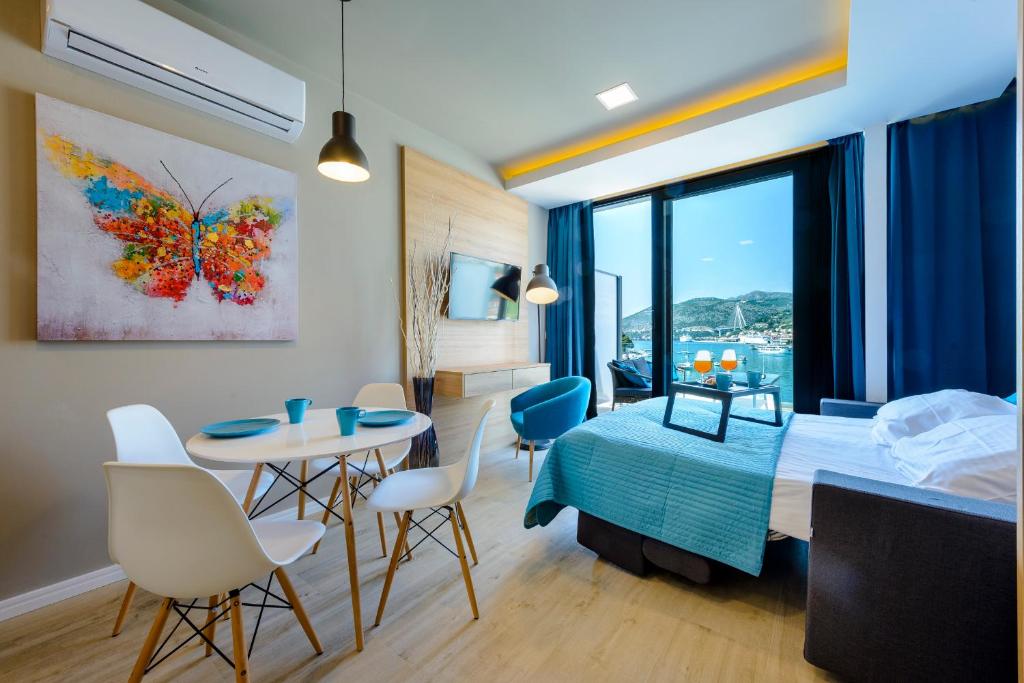 Postel nebo postele na pokoji v ubytování Adriatic Deluxe Apartments