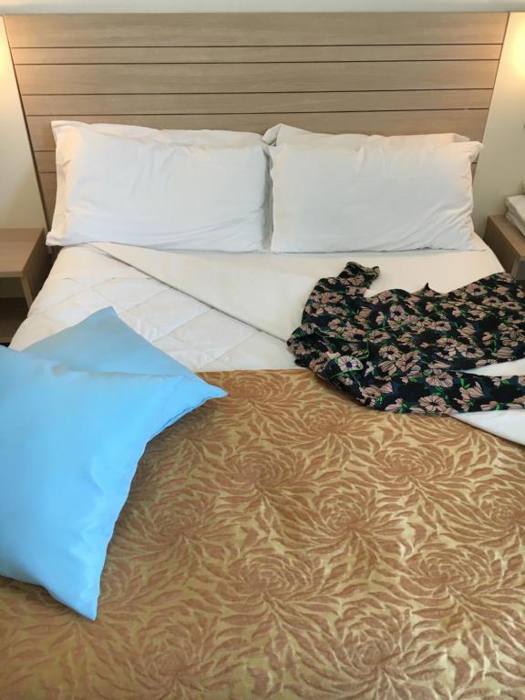 A bed or beds in a room at Residence Il Tulipano
