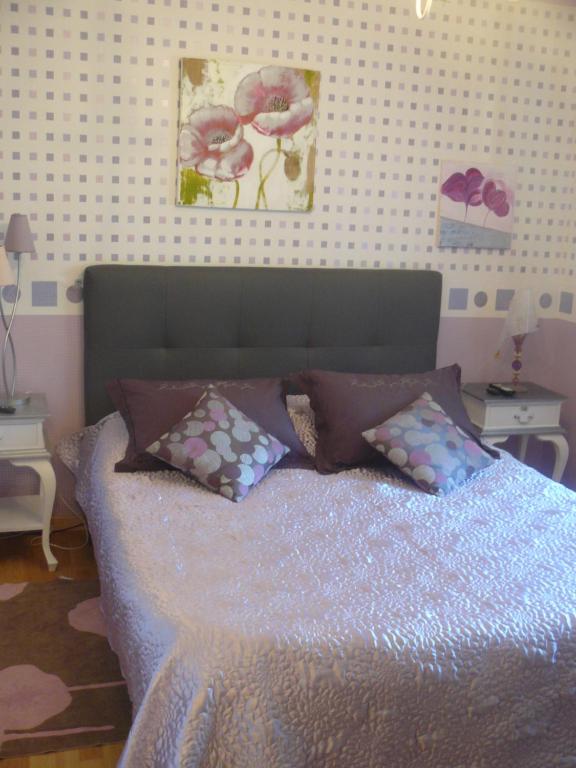 Postel nebo postele na pokoji v ubytování Les Mésanges